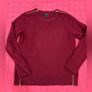 J.Crew burgundy sweater with gold zippers. Size medium.